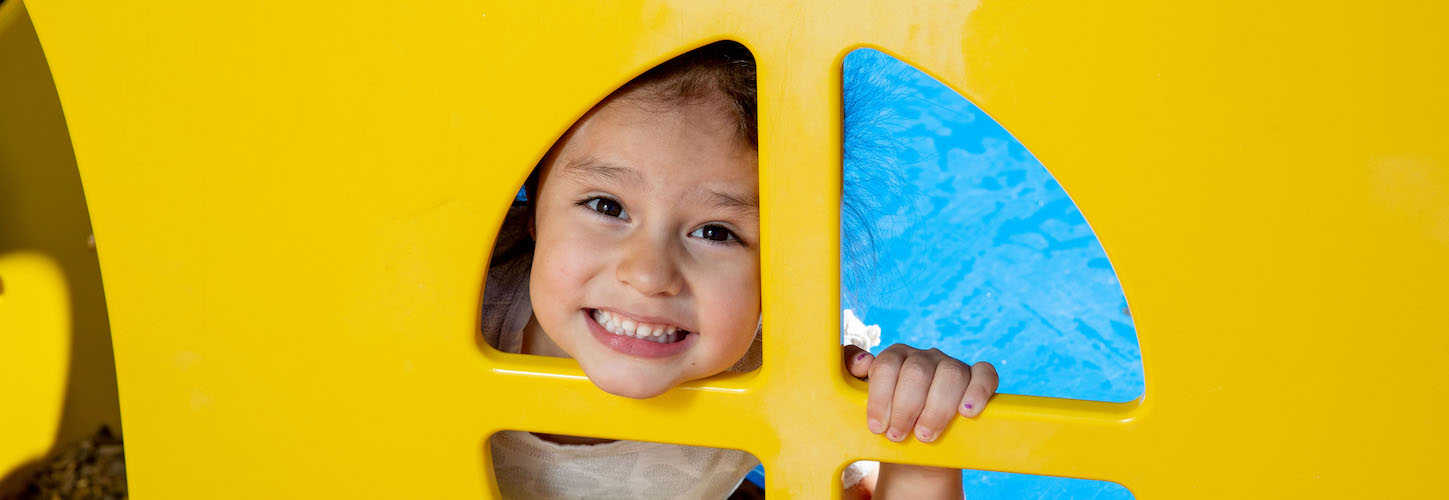 Student posing on the playground